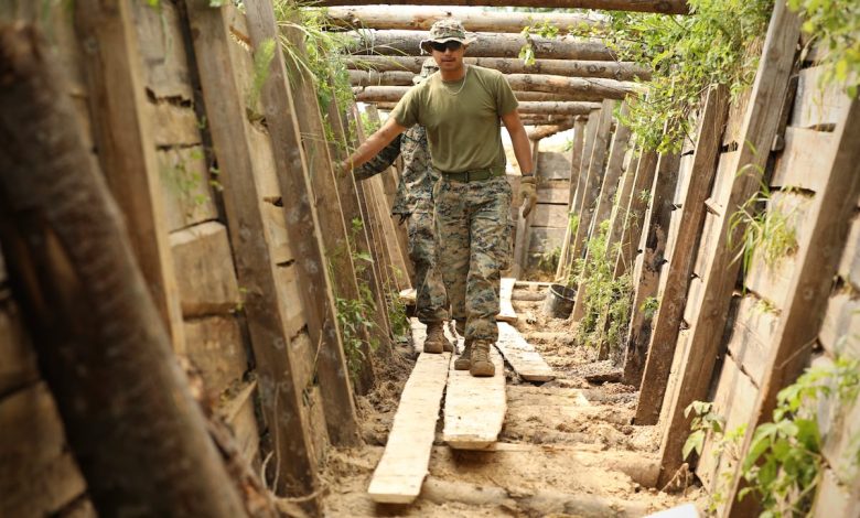 Marines and sailors combat drone threats by digging trenches Marines and sailors combat drone threats by digging trenches