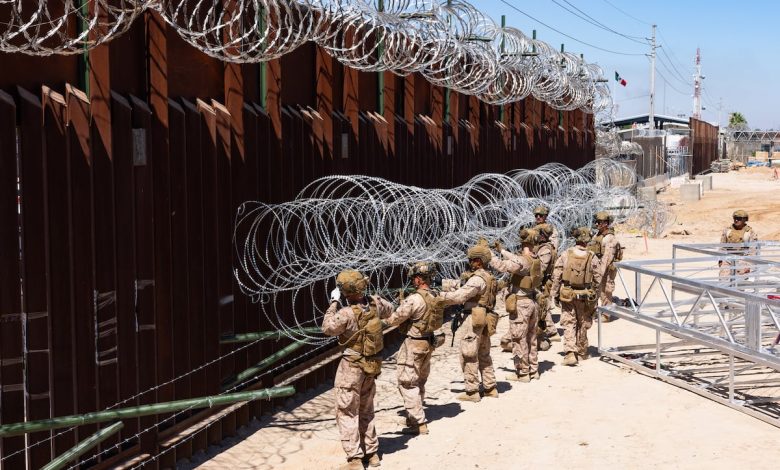 Hundreds of Marines, sailors fortify US-Mexico border wall in Arizona