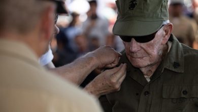 He was bayoneted in Guam. Shot on Iwo. Now, at 100, he is a sergeant.