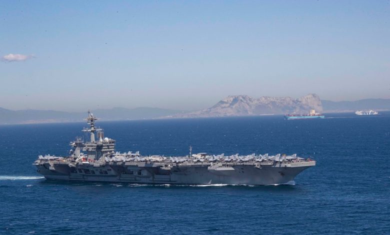 Iran puts ‘fingers on trigger’ as US armada arrives in Middle East