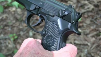 Beretta 92 FS Suppressed Close-up