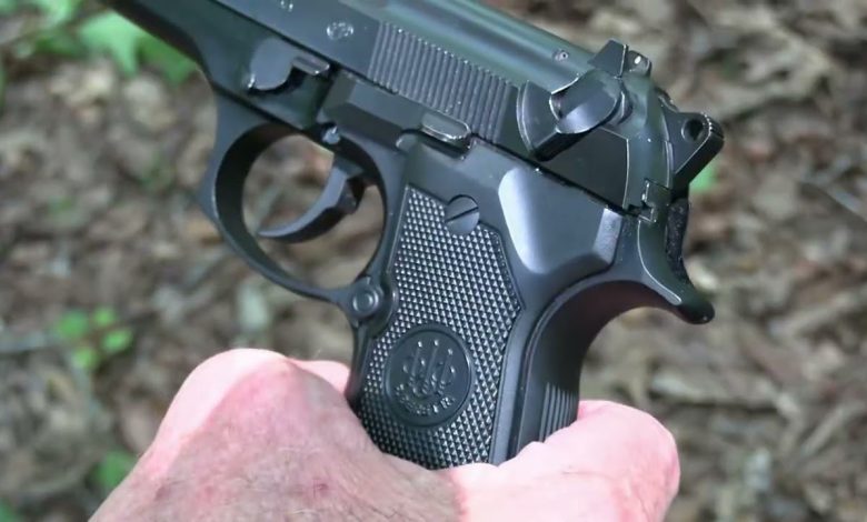 Beretta 92 FS Suppressed Close-up