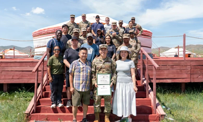 He left Mongolia to pursue higher education. He returned as a US soldier. He left Mongolia to pursue higher education. He returned as a US soldier.