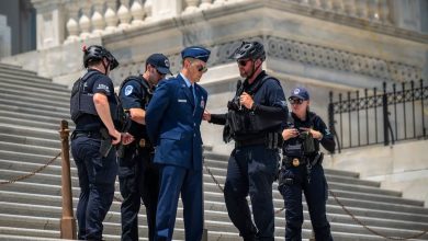 Air Force major arrested on Capitol steps during protest calling for Trump impeachment