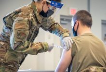 Trump promised redemption for troops who refused COVID shots. A year later, many are still waiting.
