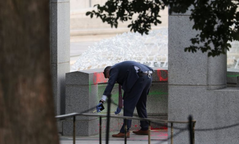 Woman charged over vandalism of World War II Memorial